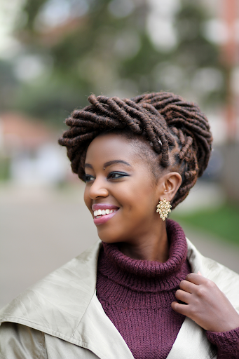 Elegant model with crown loc hairstyle.