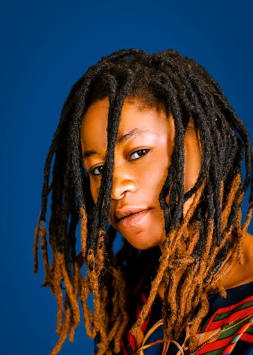 A model with frosted dreadlock tips. 